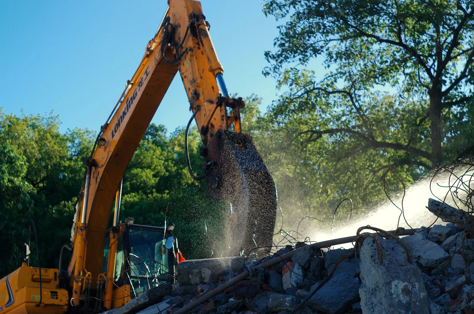 Wood chipper processing branches on site