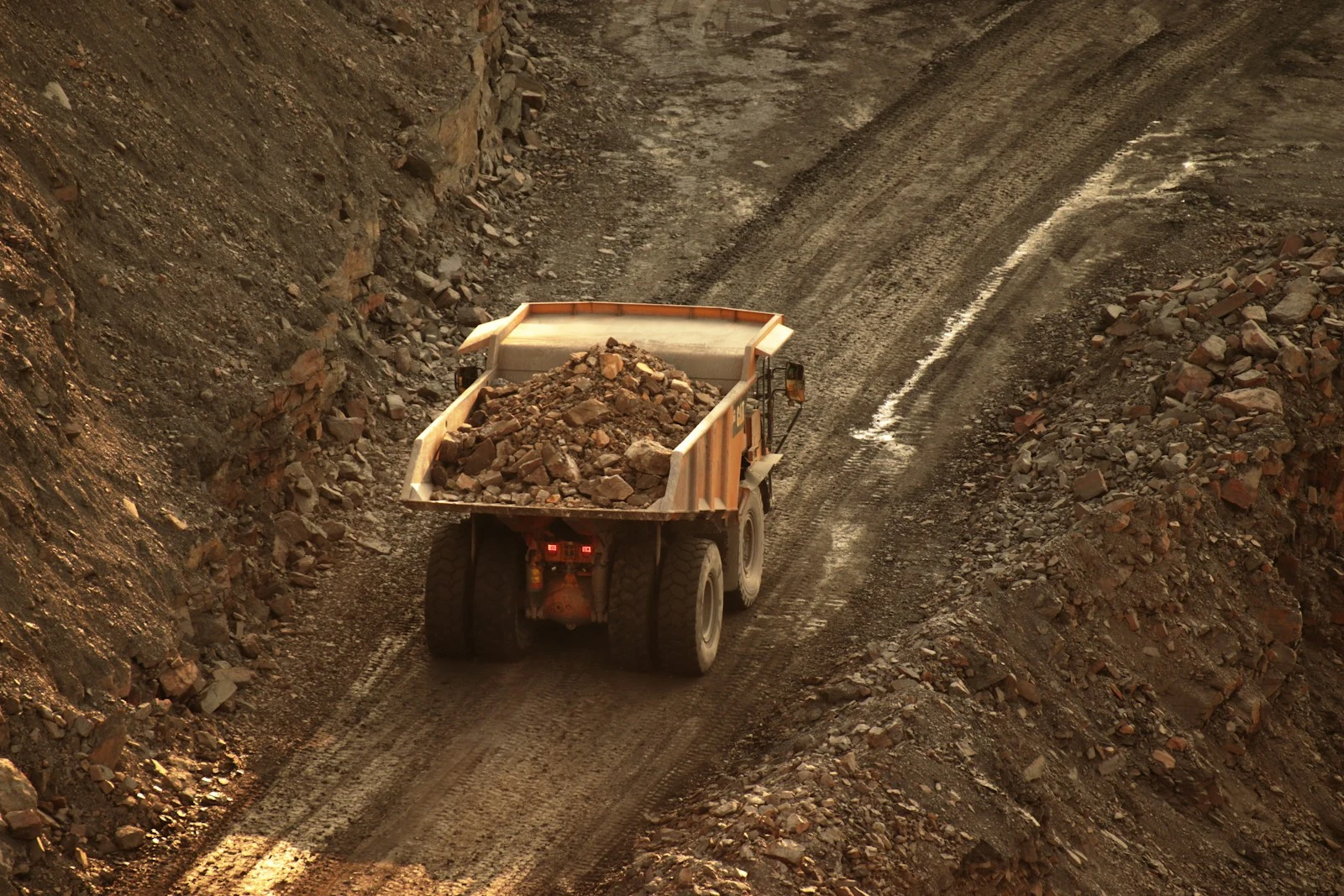 Grapple truck at commercial construction site debris removal