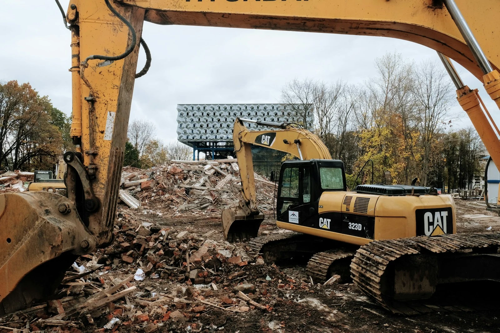 Heavy-duty grapple truck loading tree debris