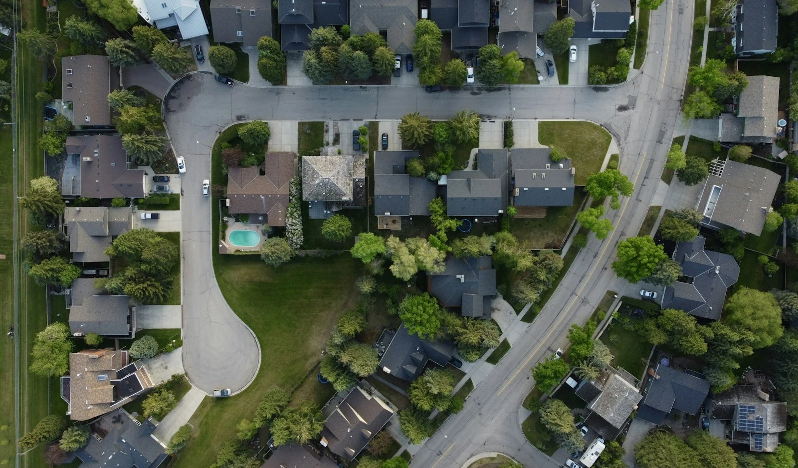 Aerial view of a suburban neighborhood with houses and streets in Orange City