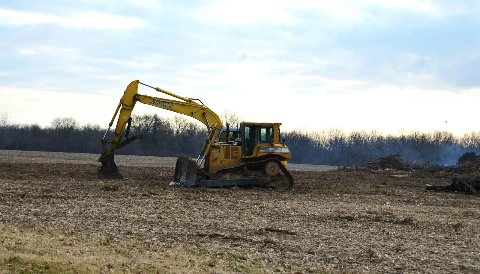 Bulldozer completing agricultural land clearing on Volusia County farm